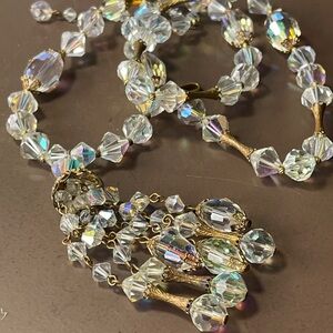 Rare Vintage 1950’s rhinestone AB tassel necklace with gold-tone findings.